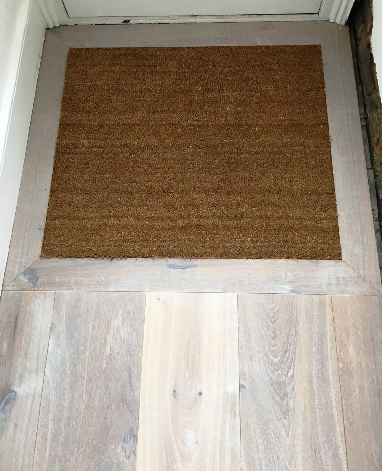 034_b_door_mat_well_picture_frame_wood_flooring_floorboards_solid